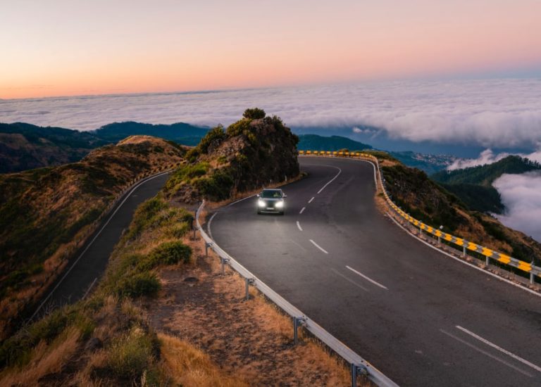 Car driving along a road