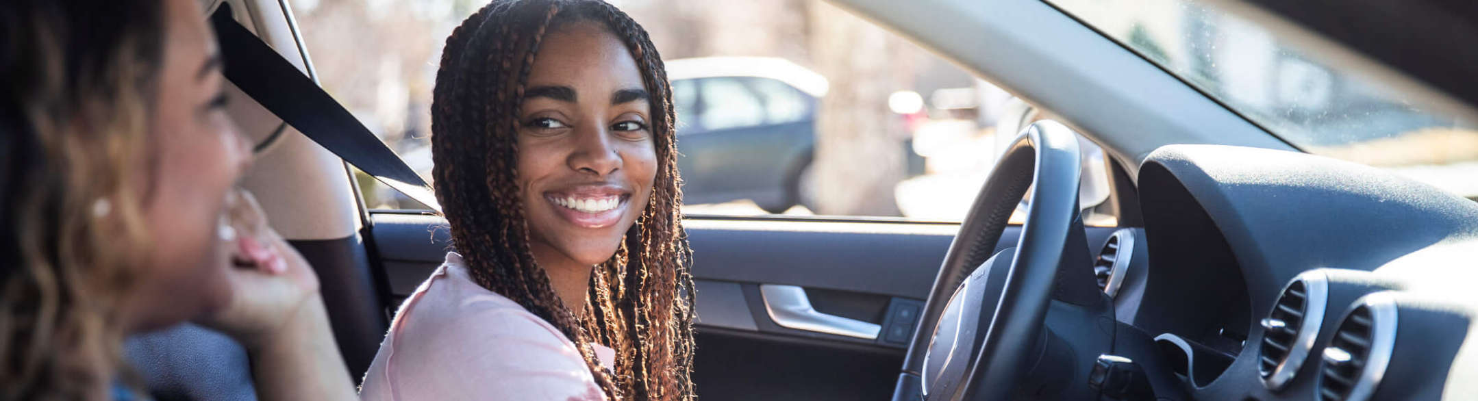 Teen driver with mom in car